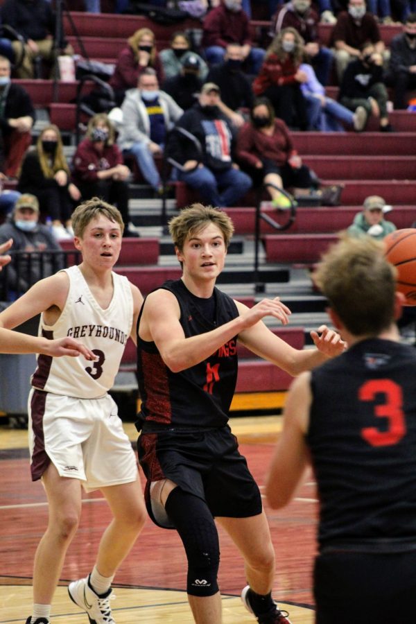 Logan Schroeder #11 gets the pass from Brody Kusnier #3