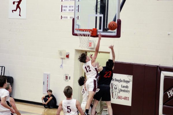 Guard Tim Palmer, #23 drives to the hoop